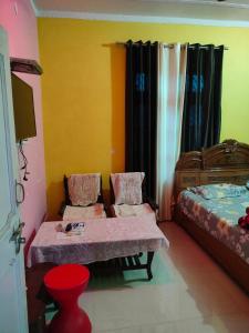 Ένα ή περισσότερα κρεβάτια σε δωμάτιο στο Rooms in Shahtalai