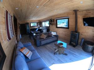 Χώρος καθιστικού στο Acogedor Refugio con tinaja y sauna +11 φωτογραφίες