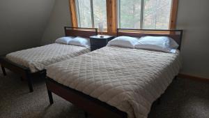 Ένα ή περισσότερα κρεβάτια σε δωμάτιο στο BigGreen