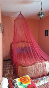 Ένα ή περισσότερα κρεβάτια σε δωμάτιο στο Banana house