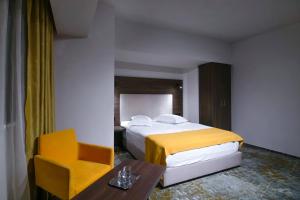 Una cama o camas en una habitación de Hotel Europeca