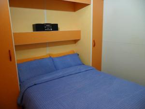 Posteľ alebo postele v izbe v ubytovaní Montsant Park Camping & Bungalow + 37 fotografií