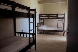 Giường trong phòng chung tại Meiyi Hot Spring Resort