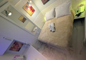 Postel nebo postele na pokoji v ubytování EV Apartment with free parking place