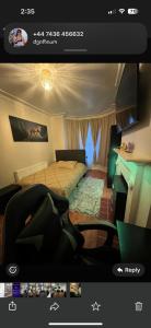 a hotel room with a bed and a desk at accommodation near Luton city centre in Luton