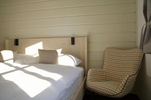 Un pat sau paturi într-o cameră la Prezidentská