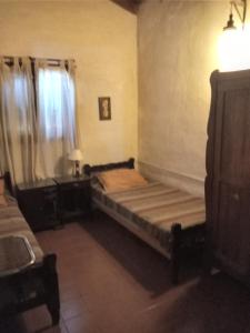 Postel nebo postele na pokoji v ubytování La Mima