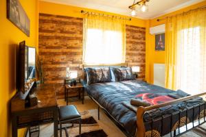 Postel nebo postele na pokoji v ubytování DREAM Home Ioannina