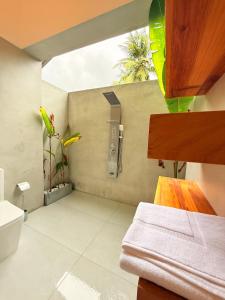 Ванная комната в Kavana Resort and Villa