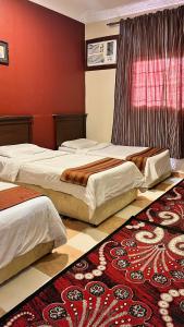 Ένα ή περισσότερα κρεβάτια σε δωμάτιο στο أللورا زون - Alora Zone