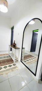 Ένα ή περισσότερα κρεβάτια σε δωμάτιο στο The Equator Haven