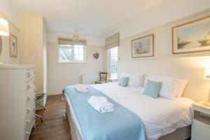 Postel nebo postele na pokoji v ubytování Sanctuary House