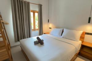 Ένα ή περισσότερα κρεβάτια σε δωμάτιο στο HomeVillas +14 φωτογραφίες