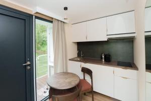 Η κουζίνα ή μικρή κουζίνα στο L'Escale Royale Torcy - Marne la Vallée +41 φωτογραφίες