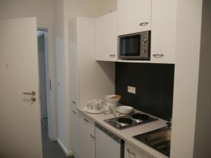 Η κουζίνα ή μικρή κουζίνα στο Herrnsheim Appartements