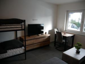 Μια τηλεόραση ή/και κέντρο ψυχαγωγίας στο Herrnsheim Appartements