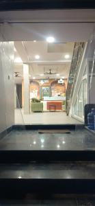 a view of a living room from the inside of a house at Shree Hari Das Chamkili Nikunj in Vrindāvan