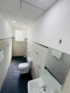 Et badeværelse på Amore Beach Resort