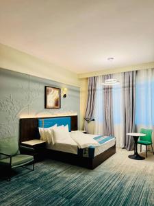 Φωτογραφία από το άλμπουμ του The Levels By 101 Hotel σε Kahama