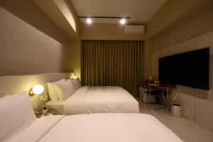 Giường trong phòng chung tại Mr Petter