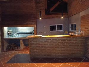 Køkken eller tekøkken på La Posada de La Lechuza Apart Hotel