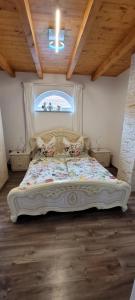 Ένα ή περισσότερα κρεβάτια σε δωμάτιο στο Manipura