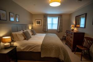 En eller flere senge i et værelse på 3 Bed in Trefriw oc-p33621