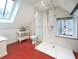 a bathroom with a shower and a toilet at 3 Bed in Edenbridge oc-o34127 in Hever +20 photos