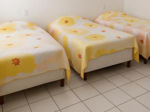 Ένα ή περισσότερα κρεβάτια σε δωμάτιο στο Departamento acogedor Hotel-Condominio Buganvillas