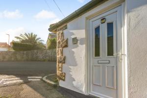 Bygningen som lejligheden ligger i + 5 billeder