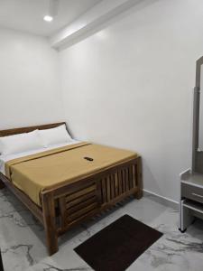 Un pat sau paturi într-o cameră la LS residency