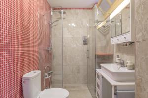 Koupelna v ubytování Corralitos Suite + 12 fotografií