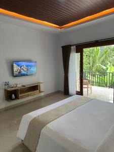 Μια τηλεόραση ή/και κέντρο ψυχαγωγίας στο D'Kusuma House Sidemen