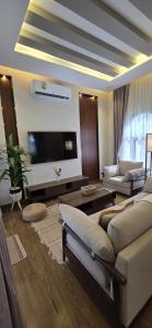 Χώρος καθιστικού στο Nasma Chalet