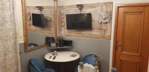 TV a/nebo společenská místnost v ubytování La Marlottine