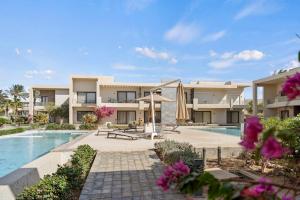 an image of a resort with a swimming pool at The G Cribs Sunlit - El Gouna in El Gouna