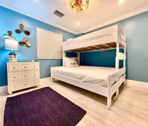 Ένα ή περισσότερα κρεβάτια σε δωμάτιο στο Sunrise Oasis - Top Floor Ocean Pointe 2411 +29 φωτογραφίες