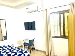 Μια τηλεόραση ή/και κέντρο ψυχαγωγίας στο GUEST HOUSE TOKOIN Casablanca