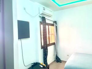 Μια τηλεόραση ή/και κέντρο ψυχαγωγίας στο GUEST HOUSE TOKOIN Casablanca +5 φωτογραφίες