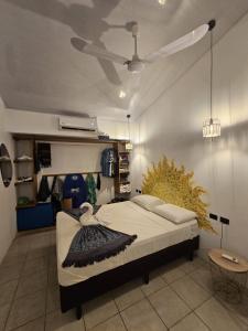 Ένα ή περισσότερα κρεβάτια σε δωμάτιο στο Boutique Studios Uvita