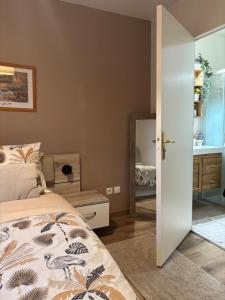 Ένα ή περισσότερα κρεβάτια σε δωμάτιο στο Jasmin