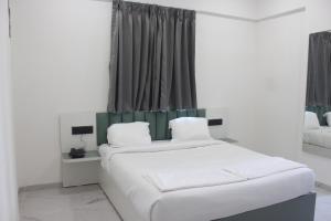 Postel nebo postele na pokoji v ubytování Zenora Stays