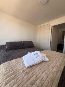 Ένα ή περισσότερα κρεβάτια σε δωμάτιο στο Vista Panorámica gran Concepción