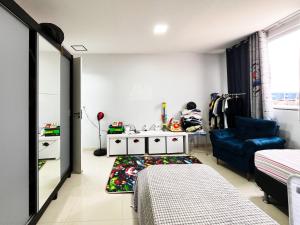 En eller flere senge i et værelse på Luxo Apartamento Marista Sul - Aparecida de Goiânia