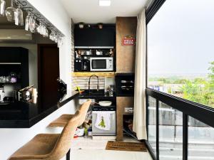Køkken eller tekøkken på Luxo Apartamento Marista Sul - Aparecida de Goiânia