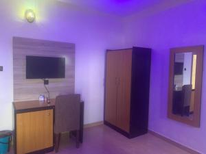 Фотография из галереи Comfort Kul Suites в городе Agbor +1 фотография