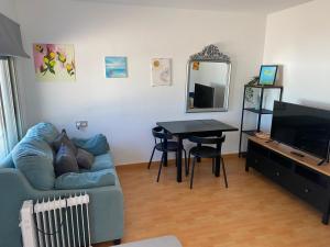 Μια τηλεόραση ή/και κέντρο ψυχαγωγίας στο Cozy cottage