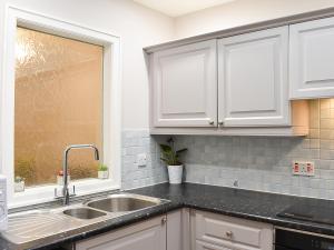 Køkken eller tekøkken på Kia Ora Cottage