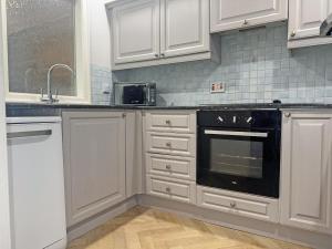 Køkken eller tekøkken på Kia Ora Cottage