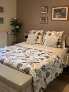 Ένα ή περισσότερα κρεβάτια σε δωμάτιο στο Jasmin